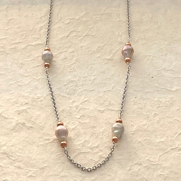 Fresh water Pinkish Pearls with Rose Colored Bead Necklace