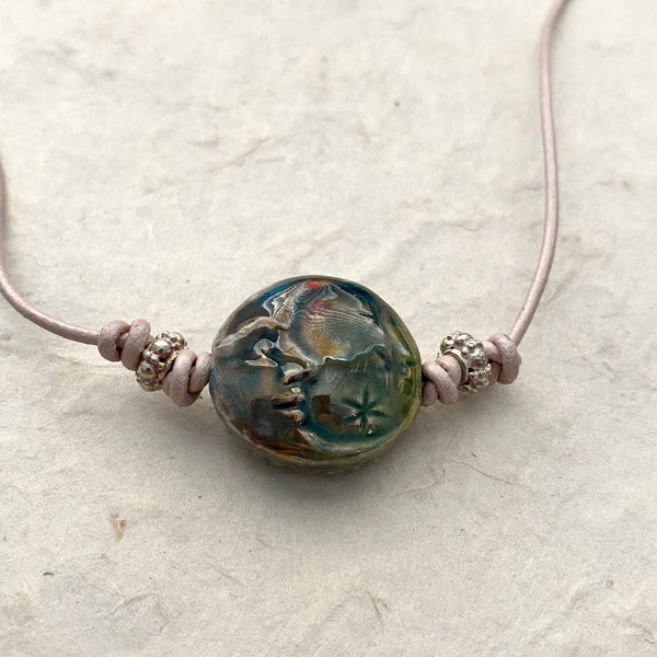 Sun and Moon Ceramic Pendant on a Pink Pearlized Leather Cord